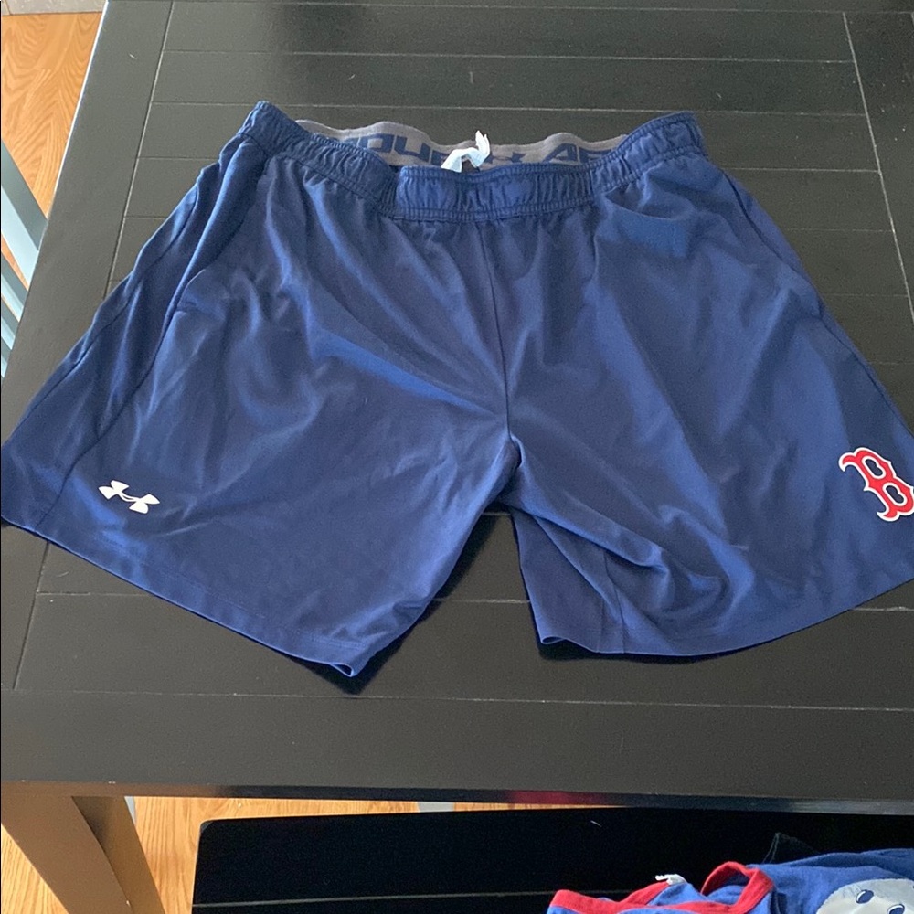 Under Armour men’s blue athletic shorts , with Red Sox logo,